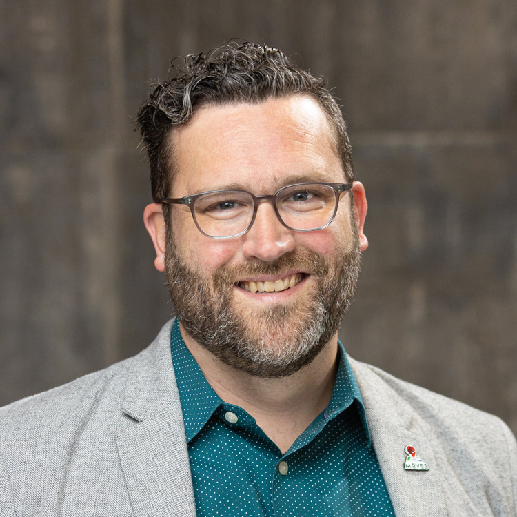 Portrait of Brian Lyman, Co-Founder and COO of MOVES Mobile Veterinary Specialists