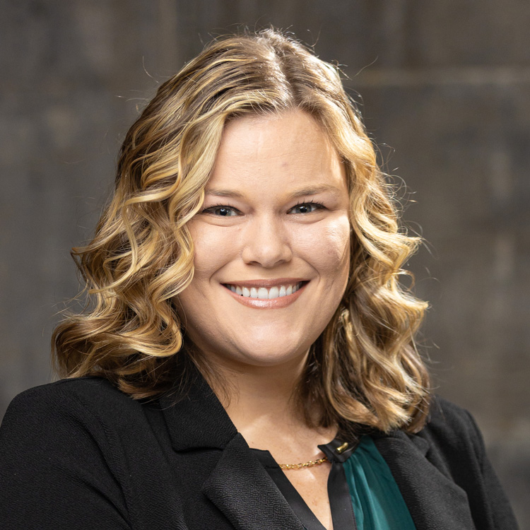Portrait of Cassandra Walsingham, Marketing Director for MOVES Mobile Veterinary Specialists