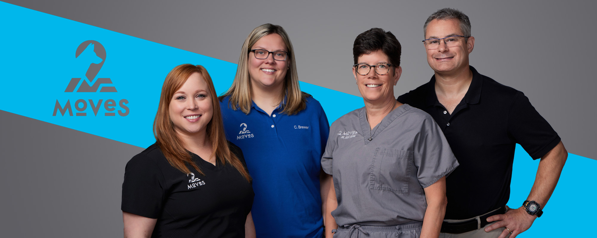 Group Portrait of the MOVES Atlanta team including Derek and Julie Duval and their veterinary technicians.